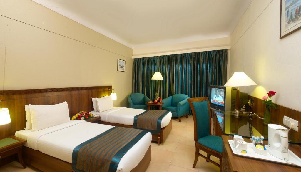 Uday Suites - The Airport Hotel Thiruvananthapuram Δωμάτιο φωτογραφία